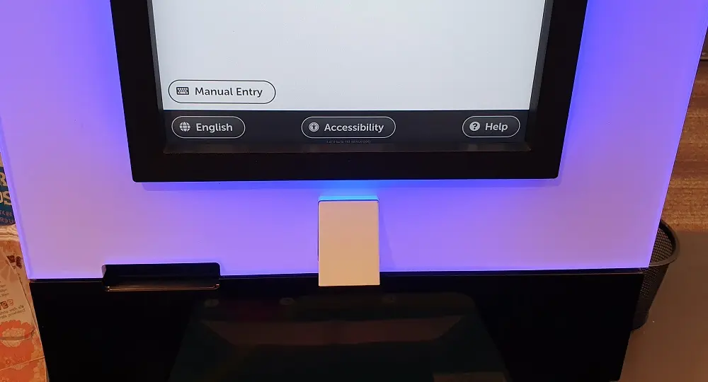 One of our self-serve kiosks, showing the accessibility button.