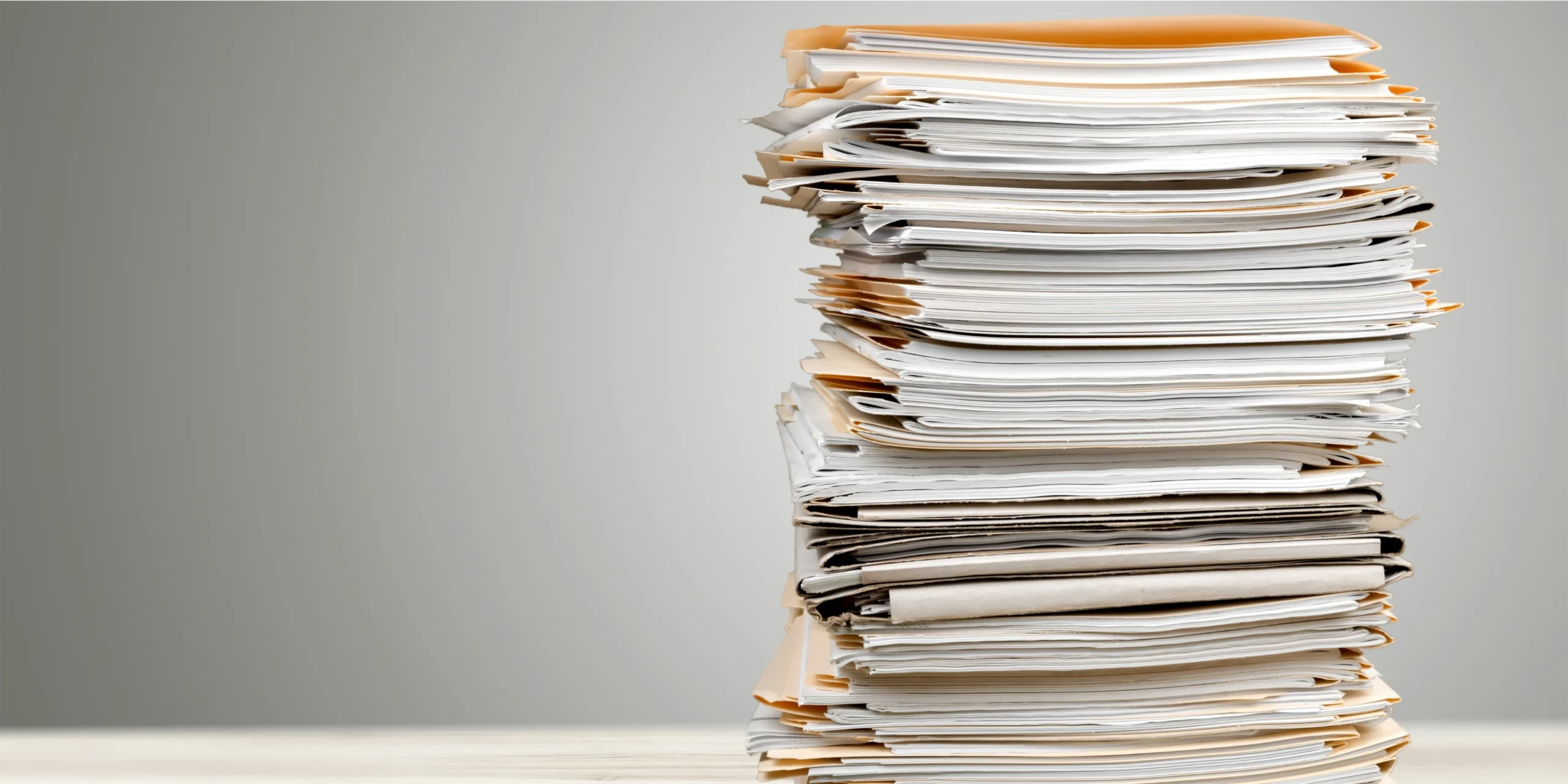 A photo of a large stack of forms.