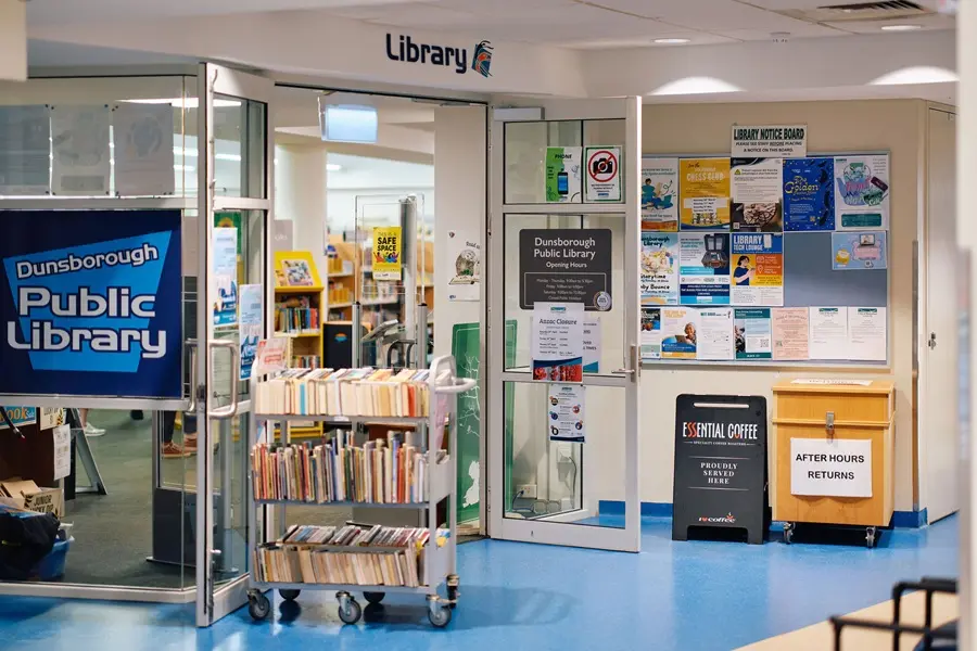 dunsborough-library-entrance-2026 The entrance to Dunsborough Library, with books for sale and after-hour returns outside.