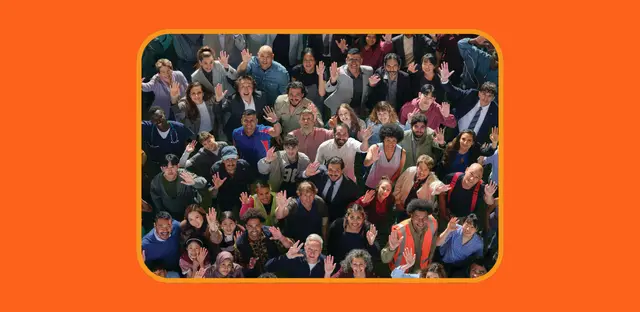 A large group of different people, each with one hand raised.